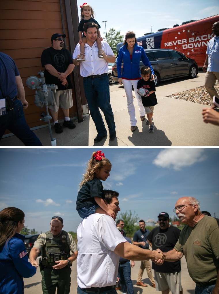 Image: Ron and Casey DeSantis walk with their children before a campaign event in Iowa on Saturday.