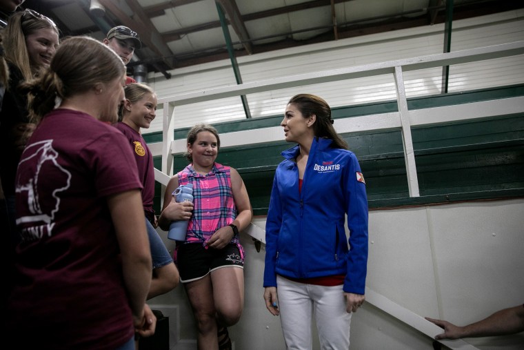 Image: Casey DeSantis talks with supporters at a campaign stop in Tama, Iowa, on Saturday.