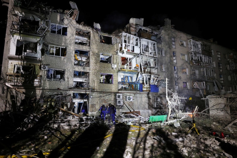 Ukraine says Russian missiles hit apartment and kill eight
