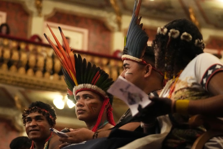 Indigenous Tembe youths attend a ceremony presenting Brazil's national Indigenous census at Teatro da Paz