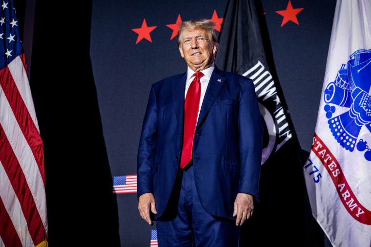 Image: Former President Donald Trump on stage before delivering remarks at Windham High School on Aug. 8, 2023 in Windham, N.H.