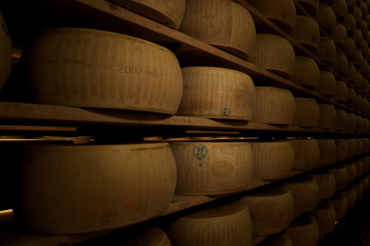 Italian man crushed to death by falling wheels of cheese