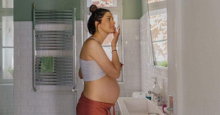Doctors say it’s important to moisturize and switch to a mineral sunscreen during pregnancy.