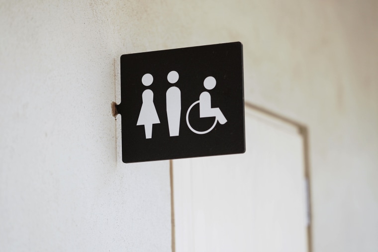 A unisex bathroom sign.