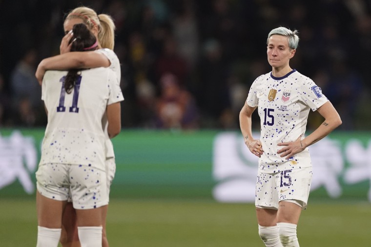Megan Rapinoe, right, and her teammates following their loss to Sweden at the Women's World Cup in Melbourne, Australia, on Aug. 6, 2023. 