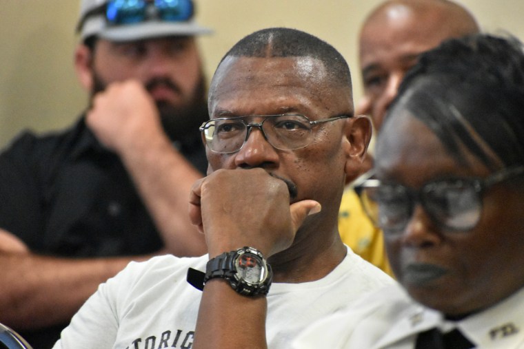 Residents who have been dealing with power outages attend a City Council meeting in Holly Springs, Miss., on Aug. 1, 2023. 