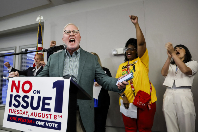 Dennis Willard, spokesperson for One Person One Vote, celebrates the results of the election during a watch party in Columbus, Ohio, on Aug. 8, 2023.