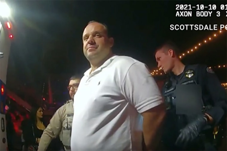 Boris Epshteyn is taken into custody in Scottsdale, Ariz., on Oct. 10, 2021.