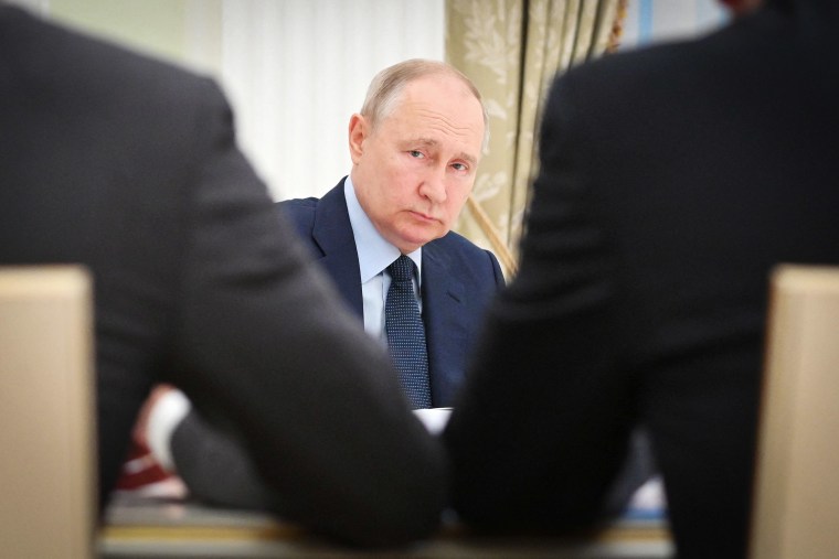 Putin weighs whether to attend G20