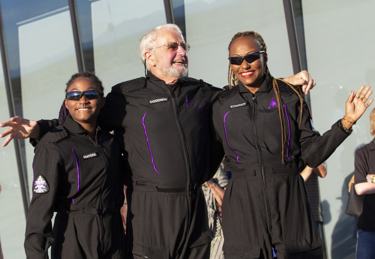 From left, Anastatia Mayers, Jon Goodwin and Keisha Schahaff before boarding their Virgin Galactic flight at Spaceport America, near Truth or Consequences, N.M.