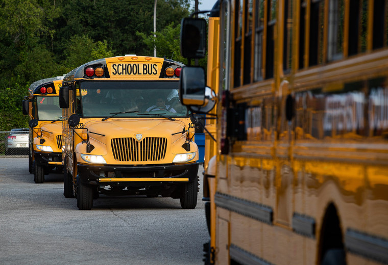 School buses packed with students on the first day of school on Wednesday, Aug. 9, 2023, Louisville, Ky.