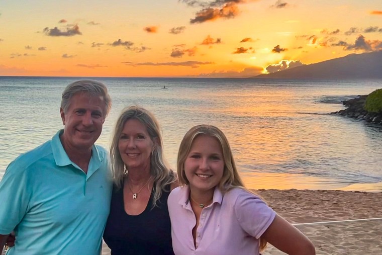 Captain Vince Eckelkamp with his wife, Kathy, and daughter during their stay on Maui.