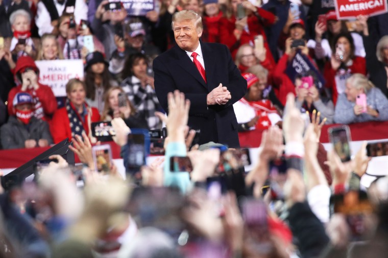 President Donald Trump attends a rally in support of Sen. David Perdue (R-GA) and Sen. Kelly Loeffler (R-GA) on December 05, 2020 in Valdosta, Georgia. The rally with the senators comes ahead of a crucial runoff election for Perdue and Loeffler on January 5th which will decide who controls the United States senate. (Photo by Spencer Platt/Getty Images)