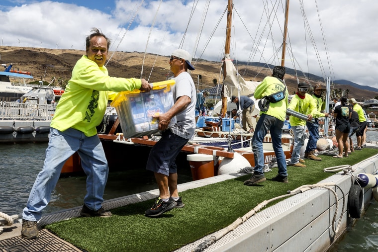 Maalaea, Maui, Monday, August 14, 2023 - Supplies for Lahaina fire victims are gathered and delivered by Hawaiians sailing on a large catamaran who often sail around the world together to Lahaina neighborhoods.