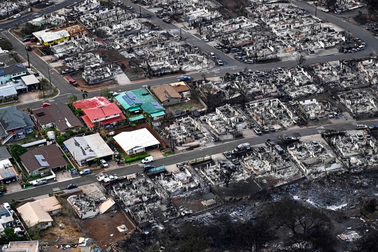 Destroyed homes in Lahaina in the aftermath of wildfires on Aug. 10, 2023.