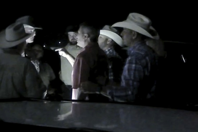 Rep. Ronny Jackson argues with officers outside a rodeo