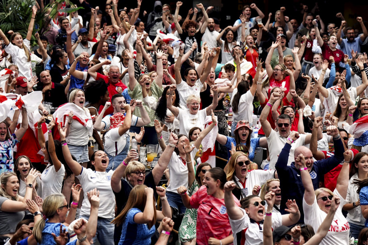 England fans celebrate their team's advance to the final of the FIFA Women's World Cup on Aug. 16, 2023, in London.
