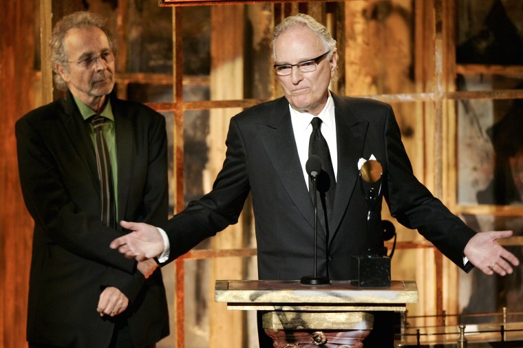 FILE - Jerry Moss, right, and Herb Alpert, co-founders of A&M Records, appear during their induction into the Rock & Roll Hall of Fame in New York on March 13, 2006. Moss, a music industry giant who co-founded A&M Records, died Wednesday at his home in Bel Air, Calif.  He was 88. (AP Photo/Jeff Christensen, File)