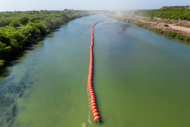 Buoy barriers are installed in the middle of the Rio Grande in Eagle Pass, Texas