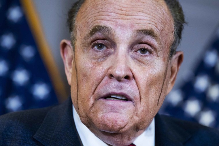 Rudy Giuliani at a news conference in November 2020 as hair dye appeared to streak down his face, an image that was frequently circulated as he tried to reverse the 2020 election results. 