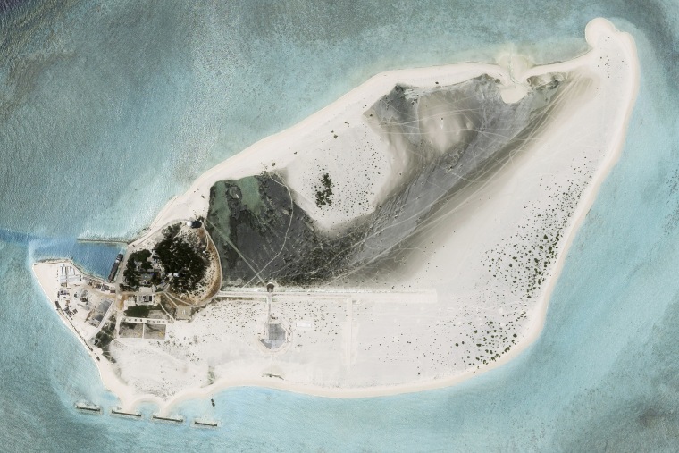 China appears to be constructing an airstrip on a disputed South China Sea island that is also claimed by Vietnam and Taiwan.