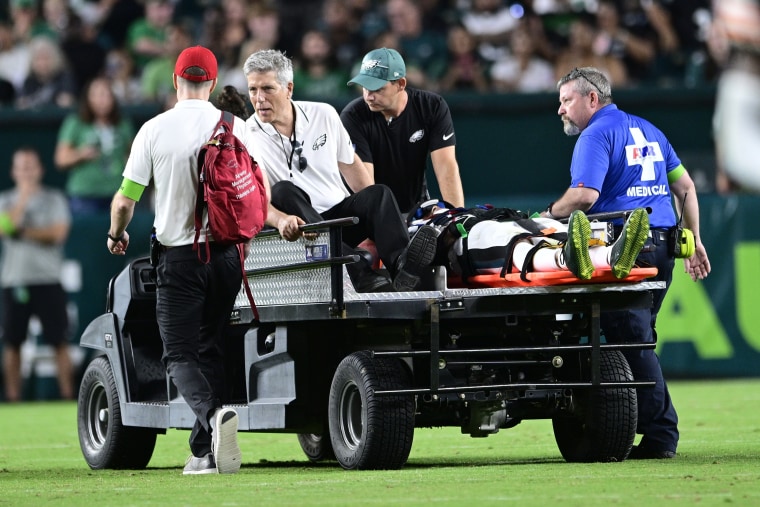 Philadelphia Eagles wide receiver Tyrie Cleveland (85) is carted off after an injury on a play during the second half of an NFL preseason football game against the Cleveland Browns on Thursday, Aug. 17, 2023, in Philadelphia.