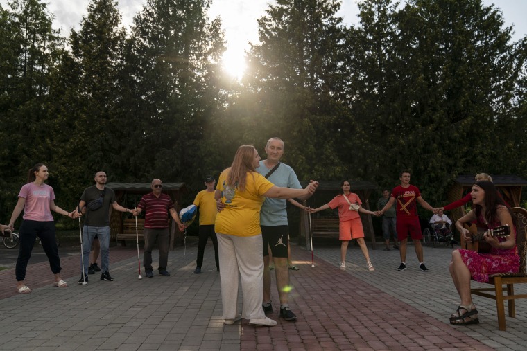 A camp teaches Ukrainian soldiers who were blinded in combat to navigate the world again
