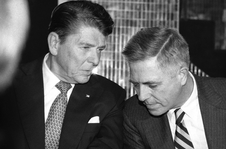 Republican presidential candidate Ronald Reagan, left, and former New York Sen. James Buckley chat at a fundraising cocktail party sponsored by the friends of the conservative party, in New York, Jan. 15, 1980. Buckley, an early agitator for Richard Nixon's resignation and winner of a landmark lawsuit challenging campaign spending limits, died Friday, Aug. 18, 2023, at age 100.