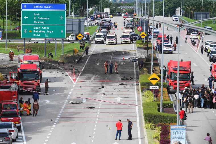 A light plane crashed on a street in Malaysia's central Selangor state on Thursday, killing eight people on board and two motorists on the ground, authorities said.