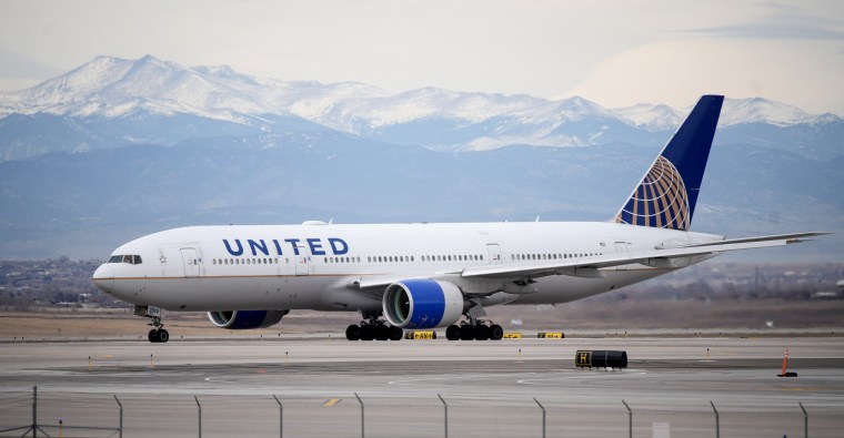 A United Airlines jetliner taxis to a runway for take off in Denver on Dec. 27, 2022. 