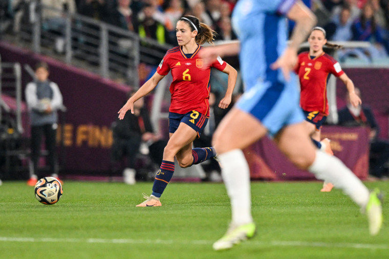 Spain's midfielder Aitana Bonmati, left, runs with the ball during the Women's World Cup final against England in Sydney on Aug. 20, 2023.