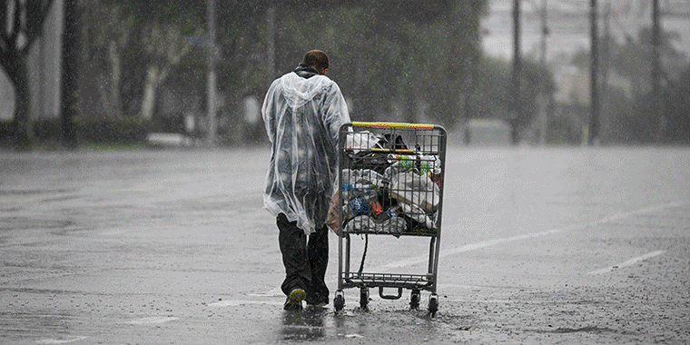 A slideshow of images showing people in Southern California preparing for the arrival of Tropical Storm Hilary on Aug. 20, 2023.