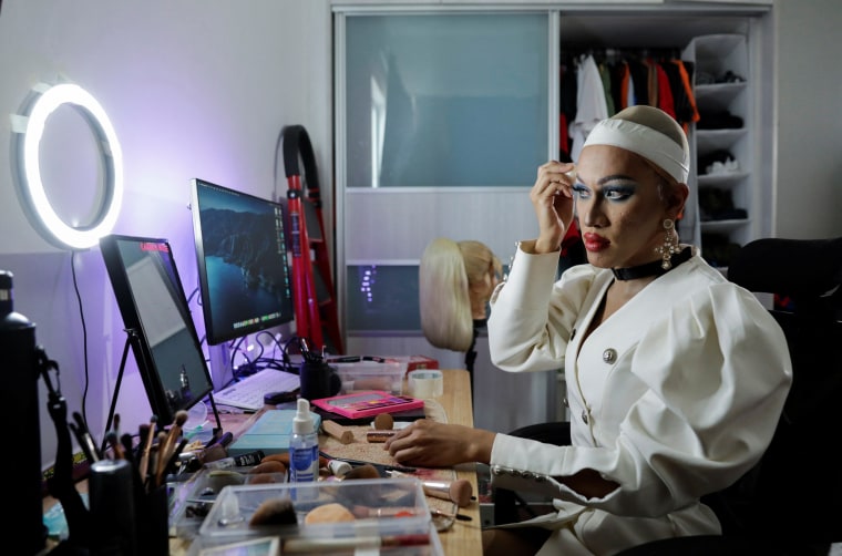 Malaysian drag queen Carmen Rose puts on make-up in Petaling Jaya, Malaysia