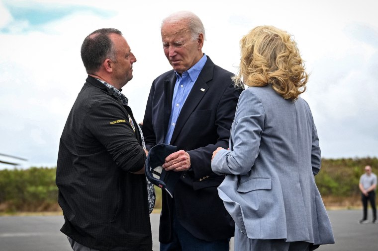 Image: President Joe Biden and first lady Jill Biden greet Hawaii Governor Josh Green upon arrival at Kahului Airport in Kahului, Hawaii, on Aug. 21, 2023.