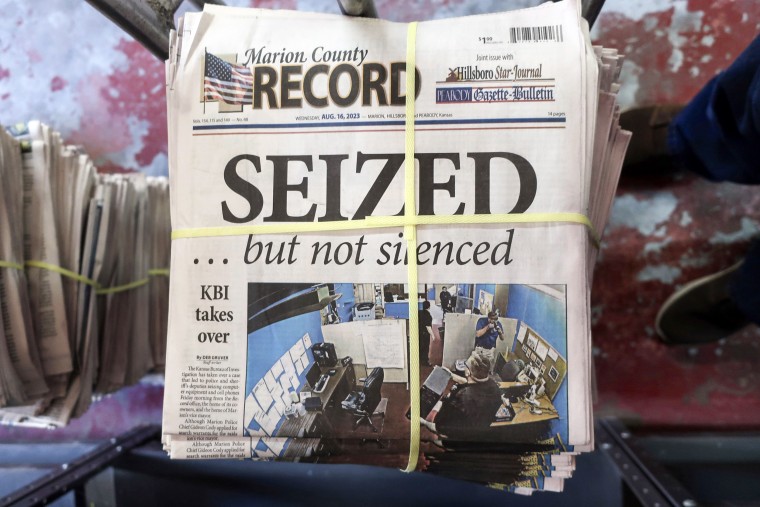 A stack of the Marion County Record edition on Aug. 16, 2023, following the police raid on the paper's office in Marion, Kan.