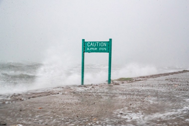 Waves in Corpus Christi Bay crash against the seawall during Tropical Storm Harold in Corpus Christi, Texas, on Aug. 22, 2023.