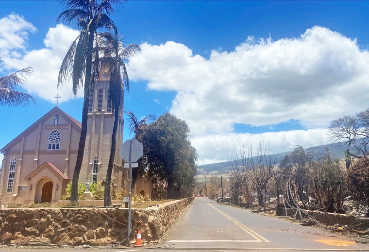 Burned houses near Maria Lanakila Catholic Church in the aftermath of a wildfire in Lahaina.