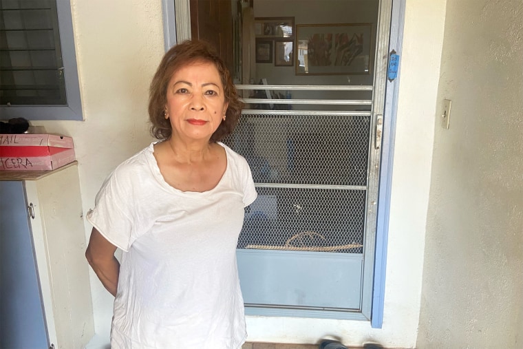 Lilia Vicera, 73, is part of a small group of residents who have continued living at home in Lahaina after the devastating wildfire.