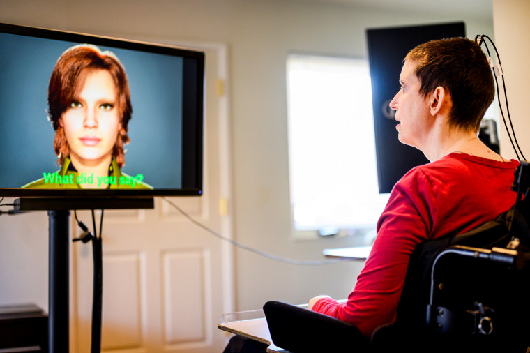 Ann, a participant in Dr. Eddie Chang’s study of speech neuroprostheses, uses a digital link wired to her cortex to speak through an avatar in El Cerrito, Calif., on May 22, 2023.