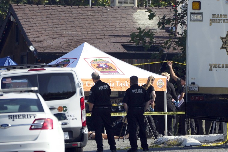 Law enforcement personnel stage at the scene of a mass shooting at Cook's Corner, Thursday, Aug. 24, 2023, in Trabuco Canyon, Calif.