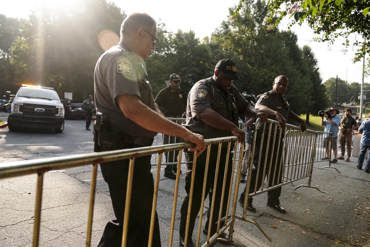 Image: Authorities put up barricades outside of the Fulton County Jail on Aug. 24, 2023, in Atlanta. 