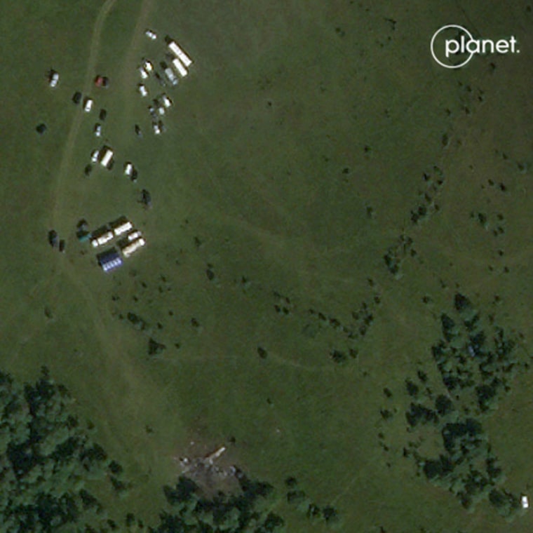 A satellite image shows the crash site Thursday in Kuzhenkino, Tver Oblast, Russia, the day after a private jet crashed, killing all 10 people on board.