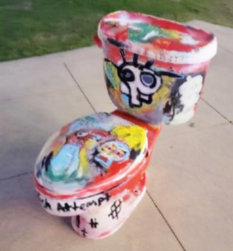 A painted toilet with a skull design left at the Americana at Brand mall.