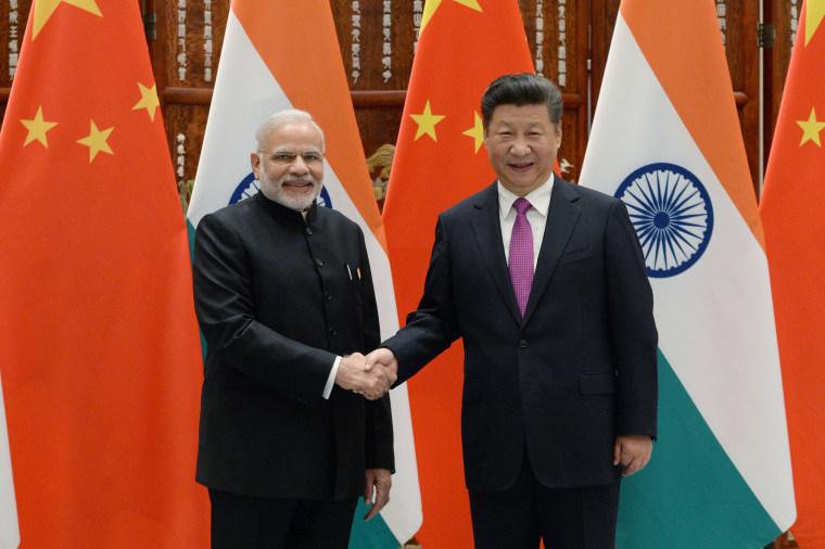 Narendra Modi, left, and Xi Jinping at the West Lake State Guest House in Hangzhou, China