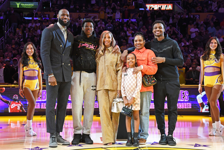 LeBron James and his family poses for a photo during a ceremony to honor him becoming the NBA All Time Leading Scorer before the game against the Milwaukee Bucks on February 9, 2023 at Crypto.Com Arena in Los Angeles, California.