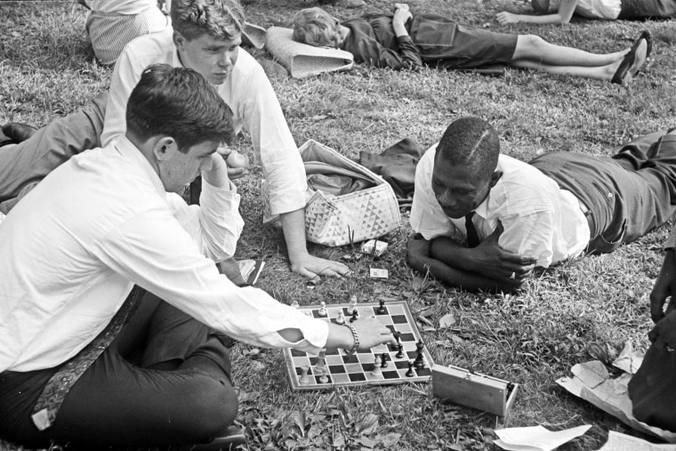 Attendees play chess.