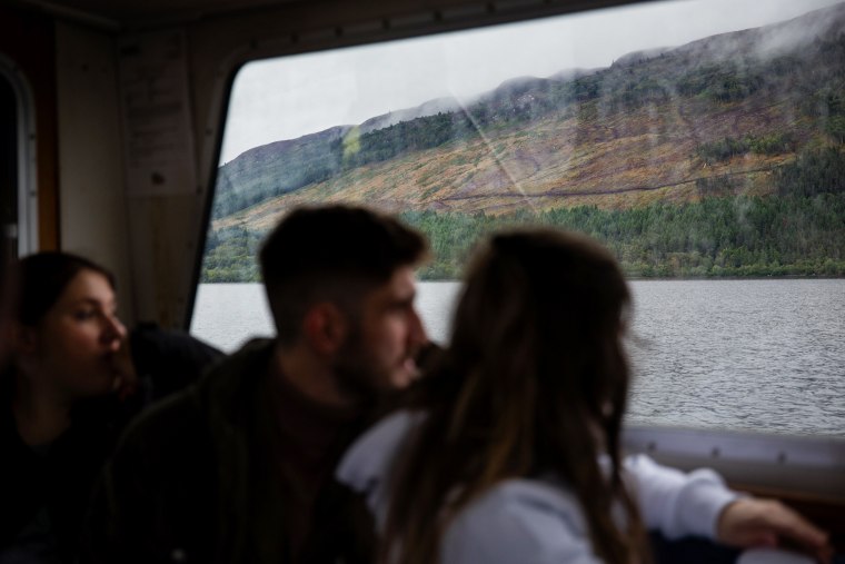 A group of visitors from Inverness take a tour on the Loch Ness Project Research Vessel to search for the famed monster.
