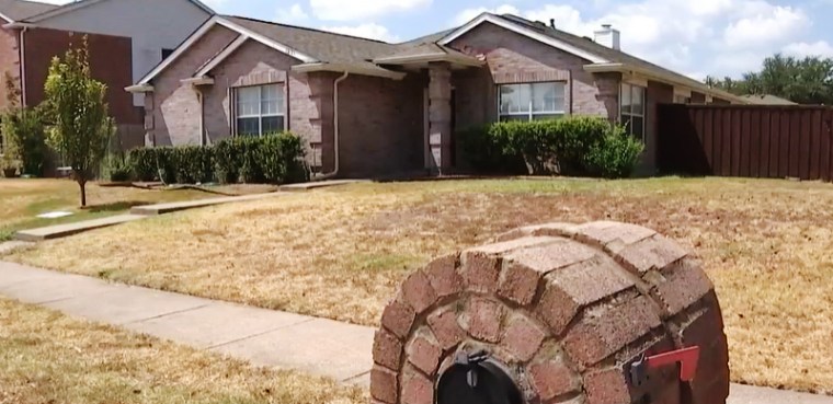 The home in Allen, Texas, where police say they found four people dead in what investigators say is an apparent murder-suicide.