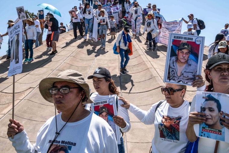 Image: Relatives of disappeared people, friends and activists take part in a demonstration in the framework of the International Day of Victims of Enforced Disappearances in Tijuana, Baja California state, Mexico on Aug. 30, 2023.