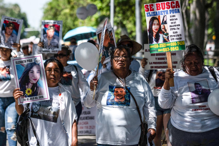 Image: Relatives of disappeared people, friends and activists take part in a demonstration in the framework of the International Day of Victims of Enforced Disappearances in Tijuana, Baja California state, Mexico on Aug. 30, 2023. 